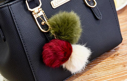 Bolsa Feminina Elegance com Pingente Decorativo e Alça Transversal